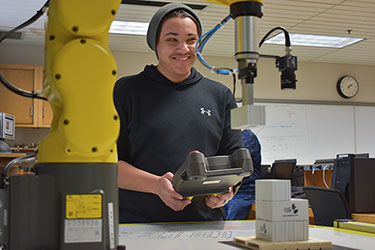 picture of student working in SSU robotics lab