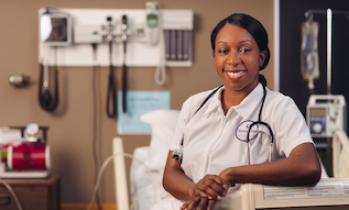 Nursing student in uniform in hospital setting