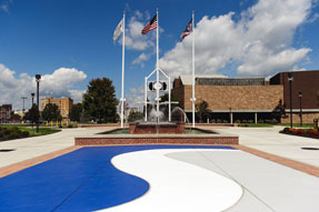 Founder's Plaza with flags flying in background