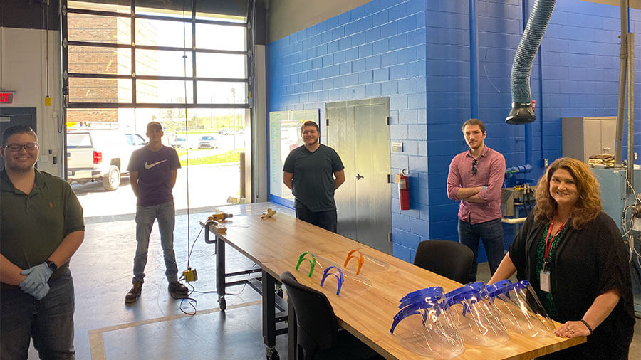 Plastics Students with face shields