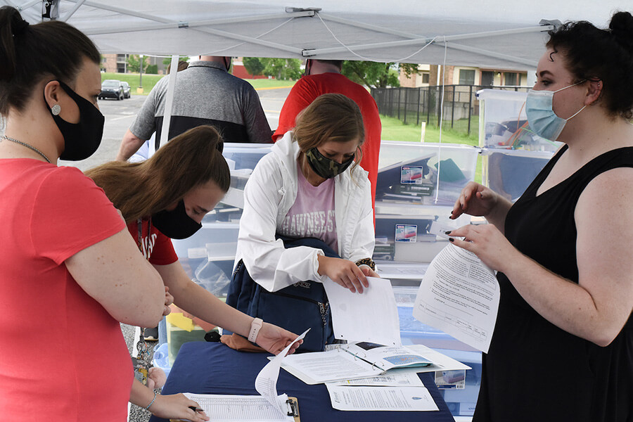 Students pick up supplies