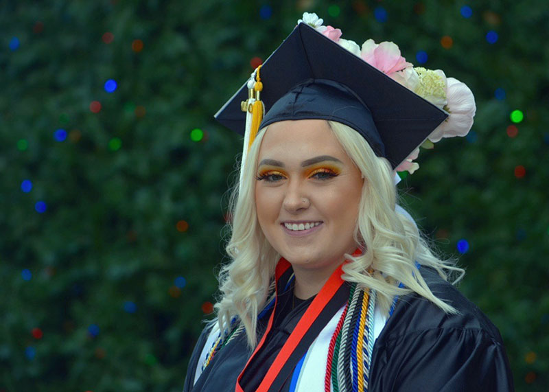 portrait of Tristan Hazlett in cap and gown