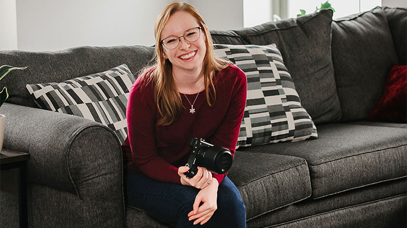 portrait of Brianna Buchholz holding camera