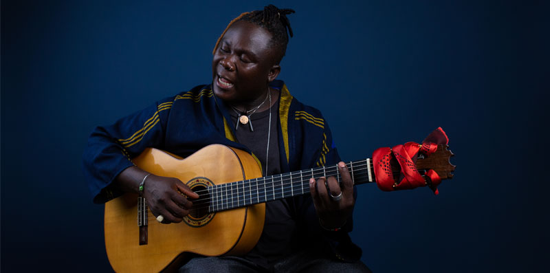 picture of man playing guitar