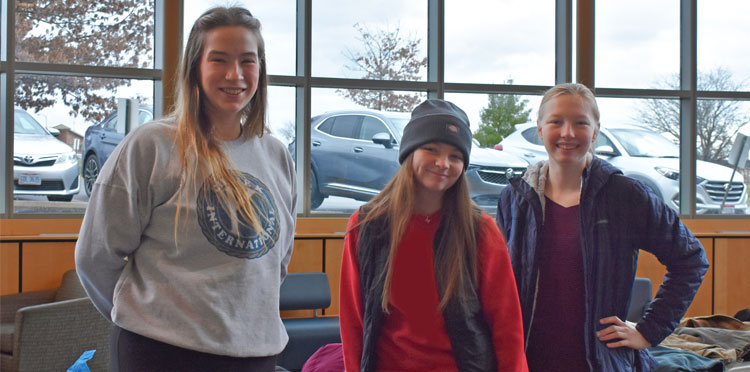 students posing for photo at CircleK Coat Drive