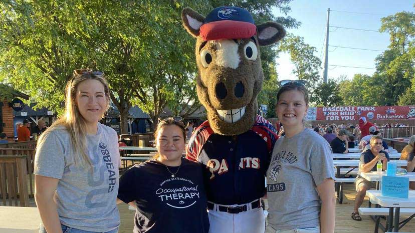 SSU students posing for photo with Paints mascot
