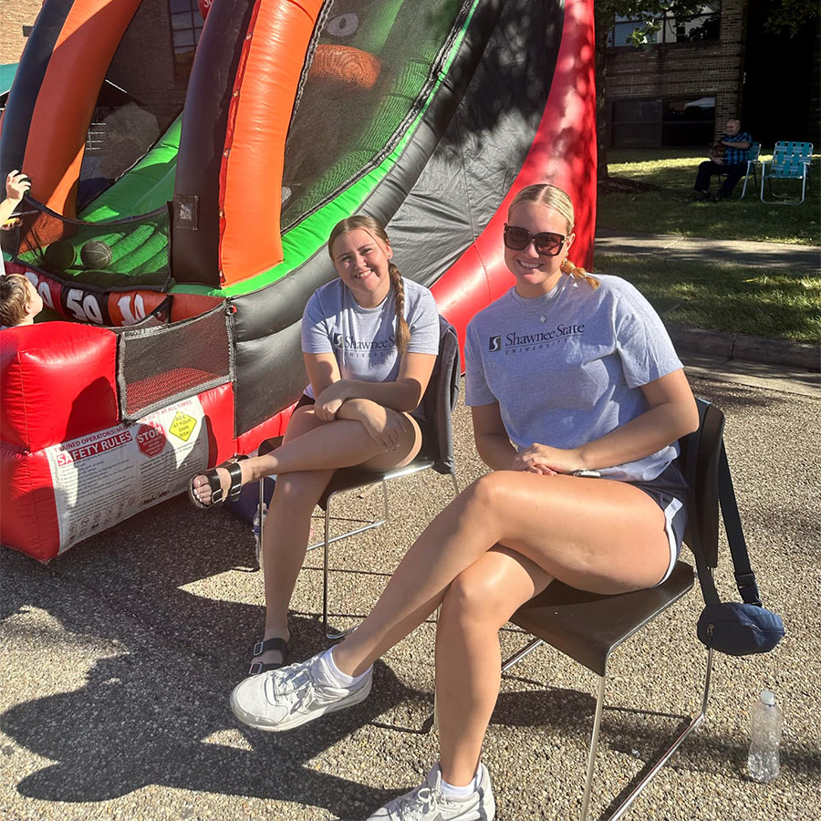 two students at campus event