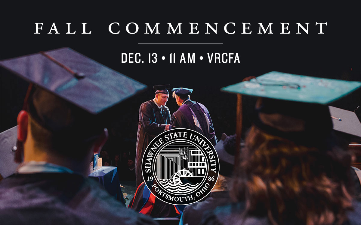 picture of person receiving diploma on stage