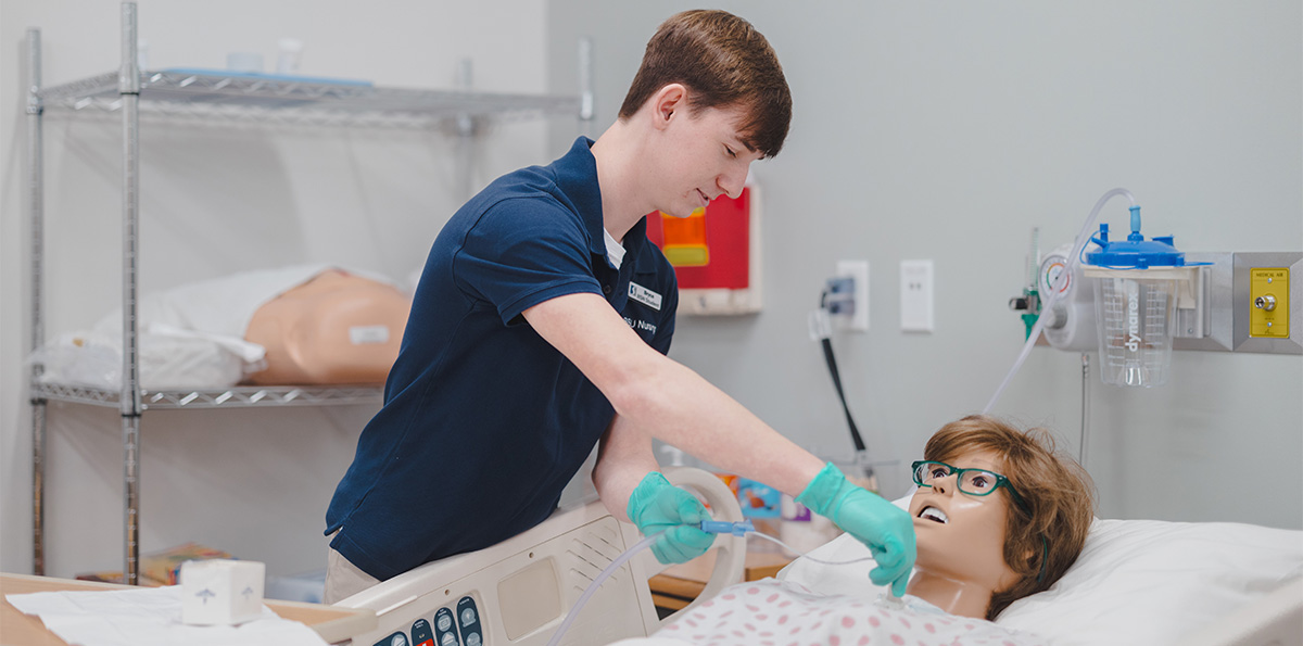 SSU BSN student taking vitals in simulation lab