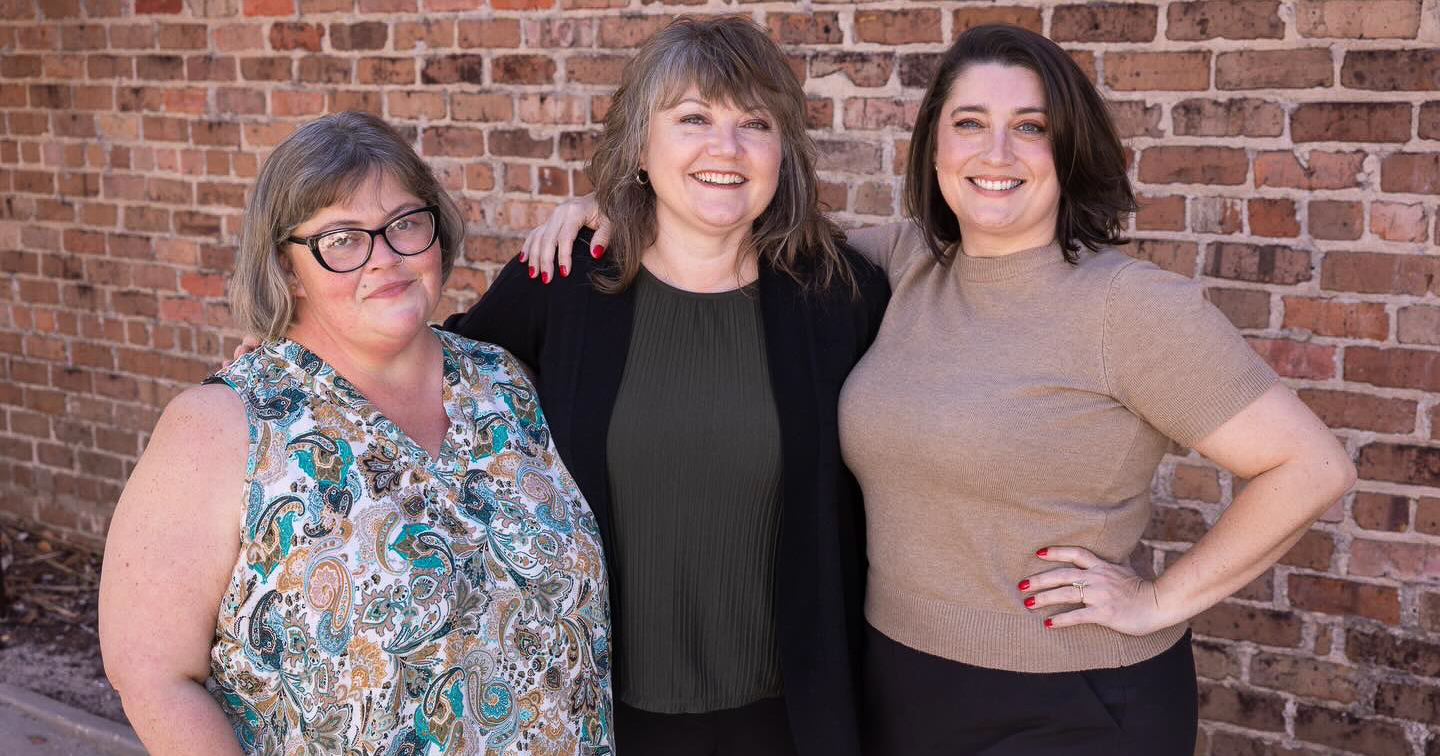 Trillium Monument Project team members Abby Spears, Amanda Page, and Amanda Lewis