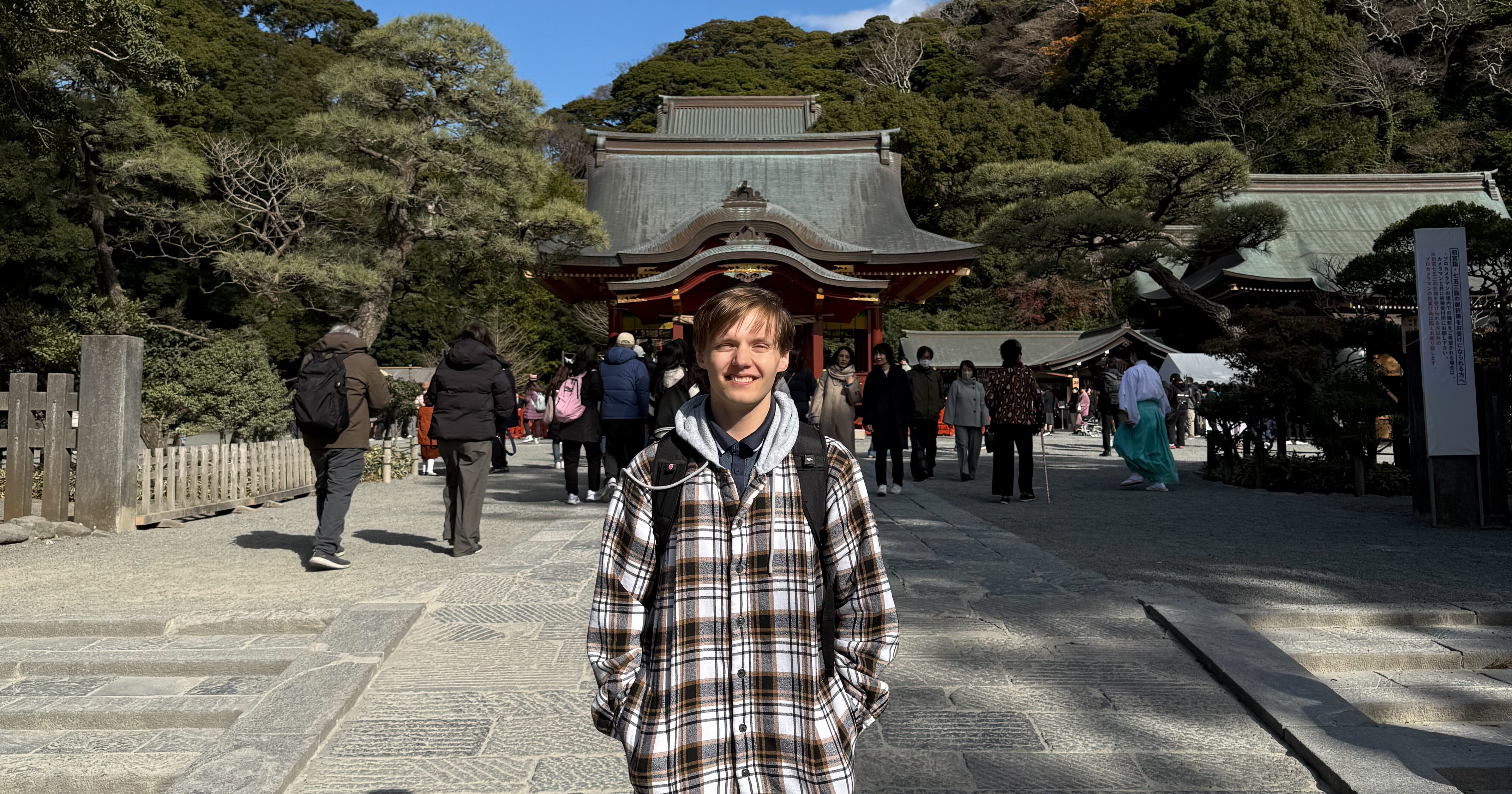 SSU student Jayden Underwood standing in front of Tsurugaoka Hachimangu Shrine in Kamakura.