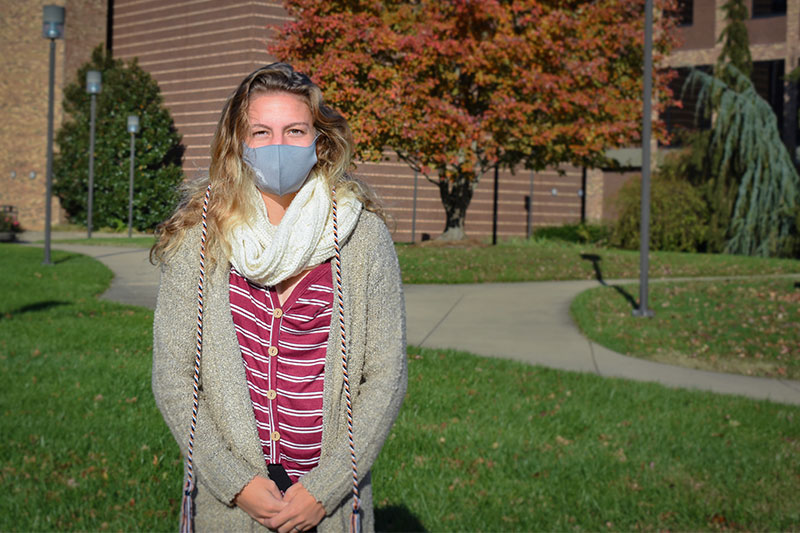 Alexia Raudier on campus wearing a mask