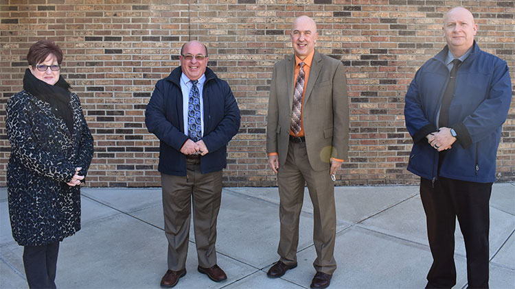 Lettie Johnson, Officer Jim Johnson, SSU President Jeff Bauer, and Director of DPS John Peters