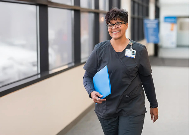 Adena caregiver walking in hospital