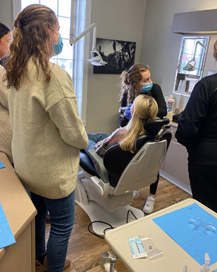 students in dentist office