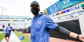 Tyler Boyles at field level in football stadium
