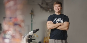 student in Biology lab