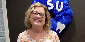 woman standing outside Dental Hygiene Clinic