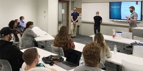 picture of student presenting in classroom