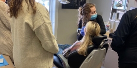 students in dentist office