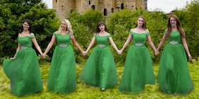 photo of dancers in front of castle