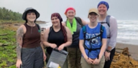 students pictured on beach