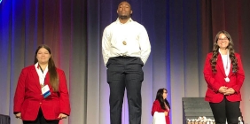 photo pf three people on platform