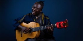 picture of man playing guitar