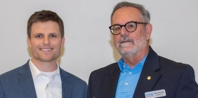 Director of the Shawnee State University Kricker Innovation Hub, David Kilroy (left) receives the 2022 Chamber Member of the Year Award, presented by Chamber Board Member Stan Jennings (right).
