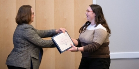 Abigail McKinney receiving award at ceremony