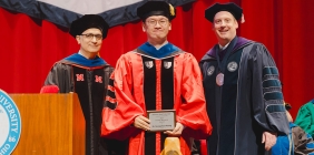 Dr. Seongcheol Paeng posing with award