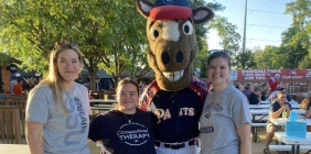 SSU students posing for photo with Paints mascot