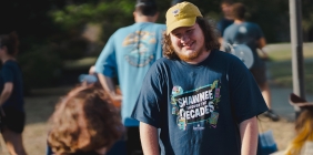 students talking on campus