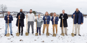 group of people holding shovels at SSU Softball ground breaking ceremony