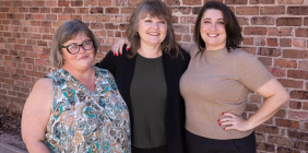 Trillium Monument Project team members Abby Spears, Amanda Page, and Amanda Lewis