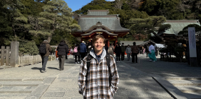 SSU student Jayden Underwood standing in front of Tsurugaoka Hachimangu Shrine in Kamakura.