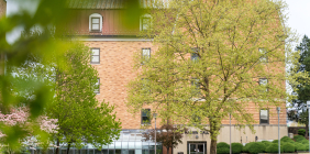 Tree outside Massie Hall building on campus