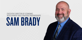 Sam Brady headshot with stylized title text