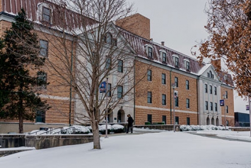 picture of Massie Hall blanketed with snow