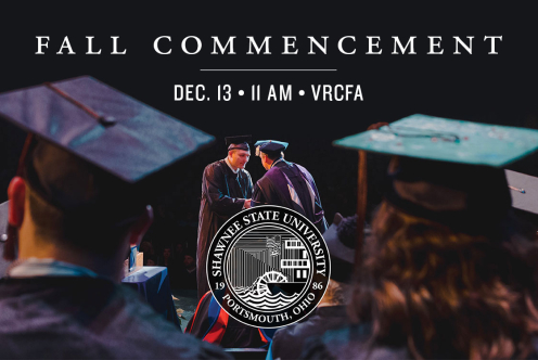 picture of person receiving diploma on stage