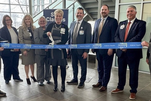 representatives from Adena Heath, Shawnee State University, and Pickaway-Ross Career & Technology Center cutting ceremonial ribbon